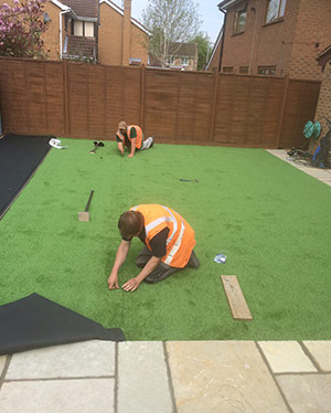 Landscape gardening scene of artificial grass